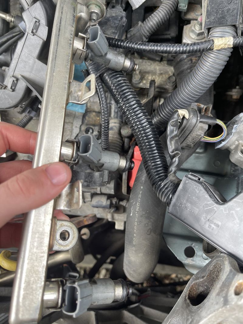 Faulty fuel injectors leading to engine misfires