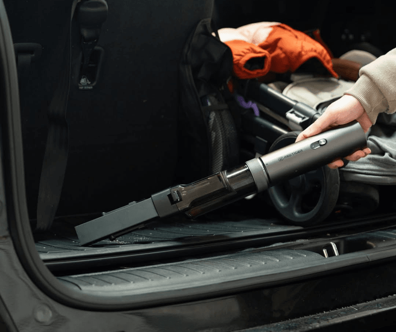 Keep a mini vacuum in the trunk