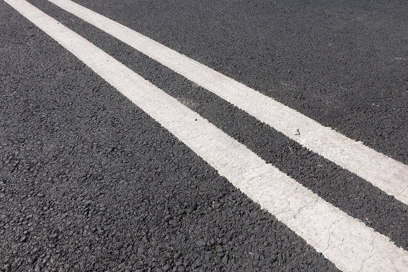 Crossing Solid White Lines