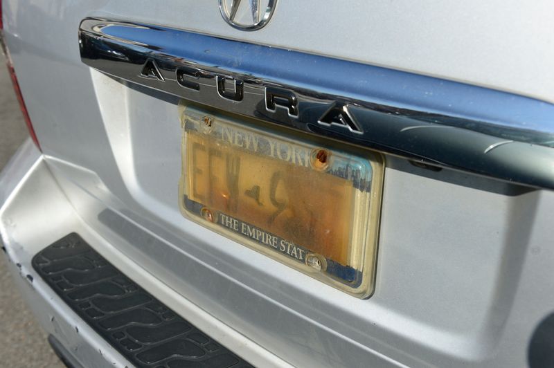 Driving With Obscured License Plates